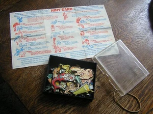 1974 Cadaco 24~Piece Cluster Puzzle No. 2 FIGMENTS w/ Hint Sheet & Plastic Case - Picture 1 of 7