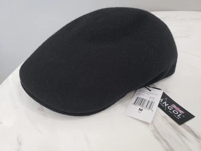 RARO LOGOTIPO DORADO NUEVO Kangol Sin Costuras Tropic 507 Ventair Gorra Plana Lana Negra MEDIANA Foto 1 de 4