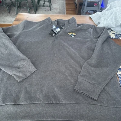 Pulôver masculino NFL ANTIGUA 1/4 zíper JACKSONVILLE JAGUARS MOLETOM GG cinza novo com etiquetas - Imagem 1 de 4