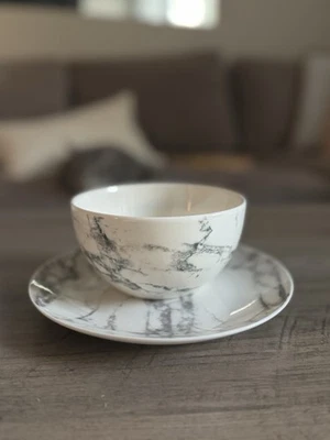 Cuencos y platos de mármol de cerámica Foto 1 de 3