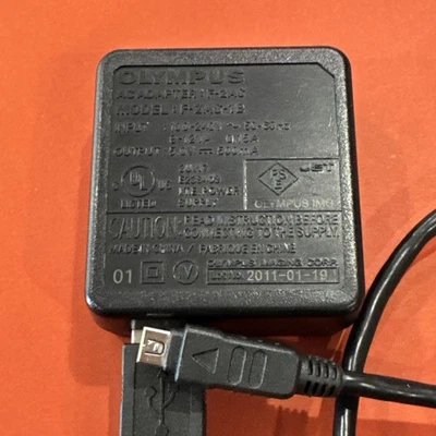 Cargador de pared de batería adaptador de CA Olympus F-2AC-1B, genuino Foto 1 de 3