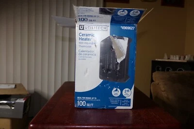 UTILITECH CERAMIC HEATER WITH ADJUSTABLE THERMOSTAT #4969627 - Image 1 of 4