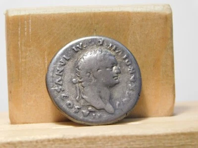 Domitian, silver denarius, 81-96 AD, Roman Imperial. Goat inside wreath reverse - Image 1 of 4