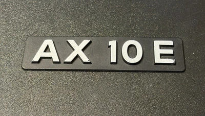 CITROEN AX 10 E - VINTAGE CAR BADGE / EMBLEM (9563852180) - 231 X 33 MM - Image 1 of 3