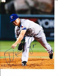 TEXAS RANGERS WANDY RODRIGUEZ SIGNED PITCHING 8X10 - Picture 1 of 1