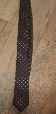 Corbata de hombre Clericci de segunda mano diseño geométrico marrón y rosa  Foto 1 de 4