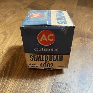 Vintage AC DELCO T3 4002 HEADLIGHT! W/ ORIGINAL BOX! 3 PRONG GUIDE 600