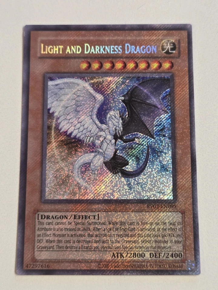 Light And Darkness Dragon RP02-EN095 (2020 Reprint) Secret Rare Holo Bleed NM - Image 1 of 1