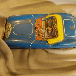 Tin    1960s  MG  MGA   6 inches  with  friction  working &  damages - Foto 1 di 2