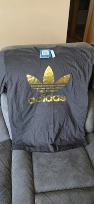 Camiseta Adidas Iconic Logo Hombre’s L Negra Con DORADA NUEVA CON ETIQUETAS  Foto 1 de 3