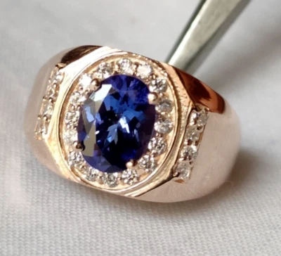 Anillo de compromiso con halo de diamantes y tanzanita azul natural de corte ovalado de oro de 14 k para hombre Foto 1 de 4