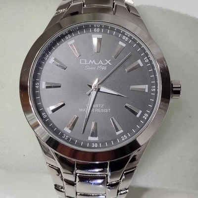 ـOMAX usa  high quality brushed stainless steel black face sparkling time piece - Image 1 of 4
