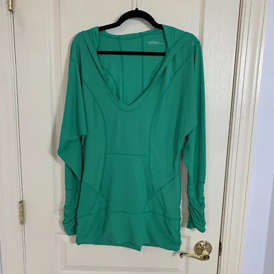 Camiseta deportiva Zella de gran tamaño verde manga larga con capucha bolsillo para mujer pequeña Foto 1 de 4