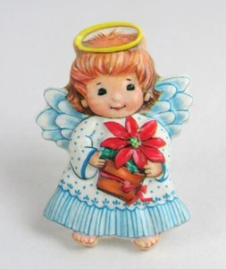 Vintage Molded Plastic Blue Christmas Angel Holding Poinsettia Plant Brooch Pin - Picture 1 of 4