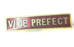 Insignia vintage de viceprefecto escolar esmalte rojo años 70 Fattorini 36 x 8 mm  - Imagen 1 de 3