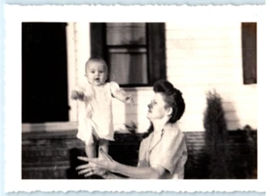 Vintage Photo May 1944, , Mother balancing baby w/ 1 hand B , 4.5x3.5 - Picture 1 of 2