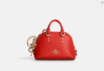 Nuevo bolso tipo cartera COACH Mini Katy rojo Miami 4” x 2 3/4” x 1 1/2” precio de venta sugerido por el fabricante 128 USD Foto 1 de 2