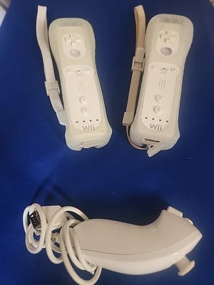 Official Nintendo- Wii Nunchuck Controller & Two Wii Controllers Lot-Used  - Image 1 of 4