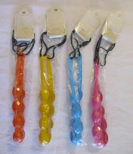 4 Gummi/Gelee Stirnbänder ~ weich dehnbar in 4 leuchtenden Farben; orange gelb blau - Bild 1 von 4