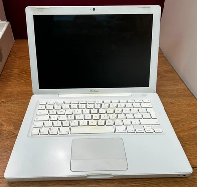 2008 Apple MacBook A1181 Reset, Firewire Cables And Remote Tested And Working  - Image 1 of 4