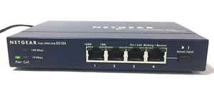 Netgear DS104 4-Port Fast Ethernet Dual Speed Hub w/ Power Adapter - Picture 1 of 3