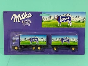 GERMAN ADVERTISING MODEL TRUCKS 1:87 HO SCALE MILKA GOLD WHEELS MERCEDES ACTROS - Picture 1 of 8