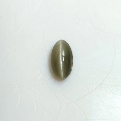 Piedra preciosa crisoberilo natural ojo de gato: 0,75 quilates rara ovalada verdosa cabina A-645 Foto 1 de 4