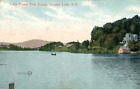 LAKE FLOWER FROM VILLAGE, SARANAC LAKE, N.Y. HOUSES. BOAT HOUSE. PEOPLE FISHING.