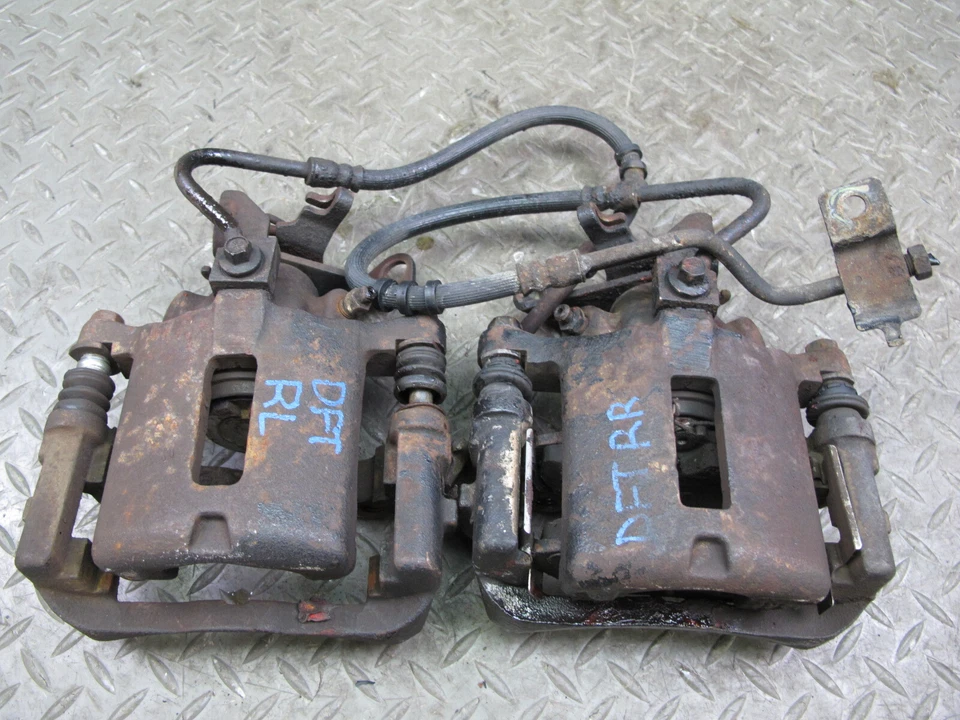 02-05 JUEGO DE 2 PINZAS DE FRENO TRASERAS IZQUIERDA Y DERECHA FORD THUNDERBIRD OEM Foto 1 de 4