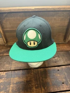 Gorra Super Mario Brothers Snapback 1-Up Mushroom 2012 Nintendo OSFM - Imagen 1 de 8
