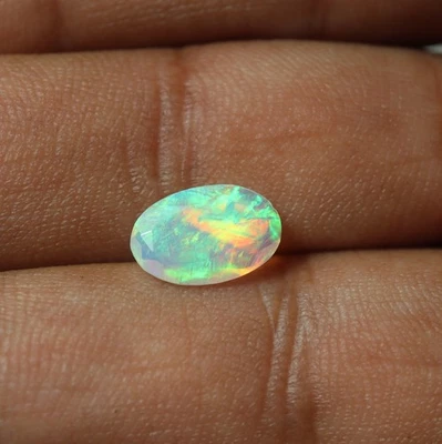 1 Cts 11x7.2 MM Real AAA Flashy Green Yellow Fire Ethiopian Opal Faceted Oval - Image 1 of 4