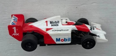 AFX TOMY SuperG+ 1991 McLaren HONDA MP4/6 #1 MOBIL BOSCH AyrtonSenna HO Slot Car - image 1 of 4