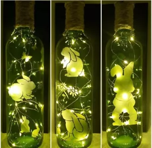 READY TO POST........RABBITS, HAND ETCHED GREEN LIGHT UP BOTTLE, BATTERY - Picture 1 of 3