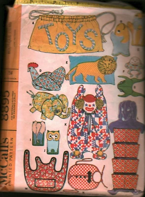 8895 Vintage McCalls Pattern Crafts Accessory Package Toy Bag Stuffed Toys Bibs - Image 1 of 3