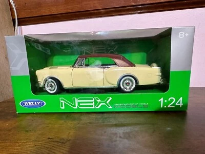 WELLY 1:24 1953 PACKARD CARIBBEAN CONVERTIBLE AMARILLO NUEVO EN PAQUETE SELLADO Foto 1 de 4