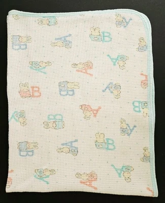 Manta térmica para bebé Carters de colección tejida gofre algodón ABC conejito azul aguamarina  Foto 1 de 4