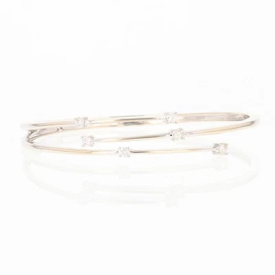 Brazalete brazalete de oro blanco de 14 k con órbita en capas de diamantes de 0,40 ctw 11,79 gramos Foto 1 de 4