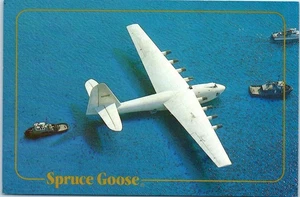 Howard Hughes' Spruce Goose being Towed Across Long Beach Harbor Calif. Postcard - Picture 1 of 2