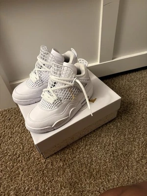 Air Jordan 4 Retro “Metallic Gold” - Image 1 of 4