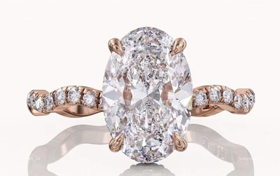 Anillo de compromiso con halo de diamantes de corte ovalado de 3,50 quilates de oro rosa de 14 k Foto 1 de 4