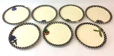 Platos de ensalada de verduras de cerámica blanca con patrón a cuadros Foto 1 de 4