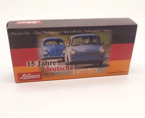 SL. 1253 Schuco Piccolo 15 Jahre Deutsche Einheit Ost trifft West 1:87 - Bild 1 von 6