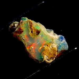 100 % natürlicher äthiopischer Opal grober ungeschliffener Opal Edelstein 7,75 kt 15 x 21 x 9 mm WY67 - Bild 1 von 7