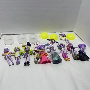 9er Set - Kapsel Chix Überraschung Mode Puppen Outfits Schuhe Schmuck - Bild 1 von 8
