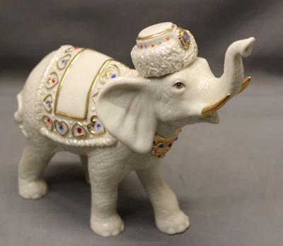 ESTATUITAS DE PORCELANA LENOX DE 7,5" ELEFANTES DE LAS TIERRAS ALTAS EN ESTADO DE MENTA Foto 1 de 4