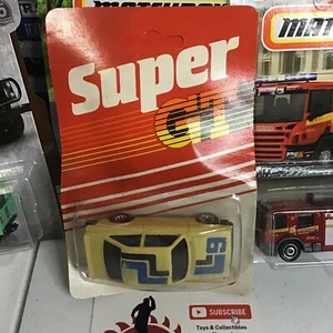 1985 MATCHBOX SUPER GT BROWN FORD ESCORT RS 2000 HATCHBACK 1/64 MIP ENGLAND - Picture 1 of 4