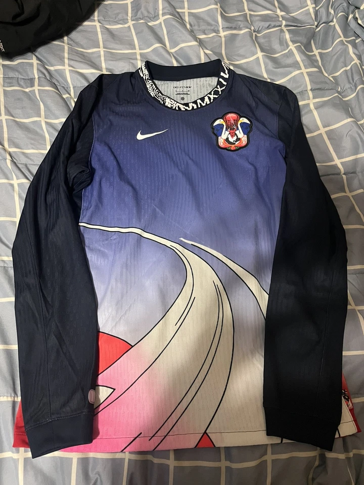 Camiseta Nike SB ADV 2024 Olympics USA Skateboarding LS masculina tamanho pequeno FD6332-451 - Imagem 1 de 4