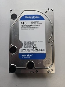 Disque dur interne 4 To WD (Western Digital) bleu SATA 6 Go/s 64 Mo cache 3,5” - Photo 1/1