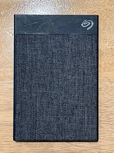 Disque dur externe Seagate 2 To Backup Plus Ultra Touch - Photo 1/4