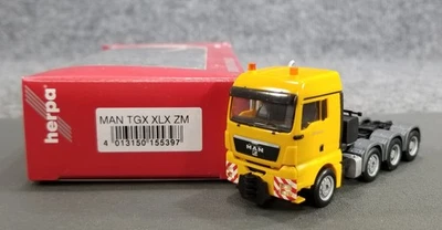 HERPA HO 1:87 155397 MAN TGX XLX ZM 4 AXLE SEMI IOB YELLOW - Image 1 of 4